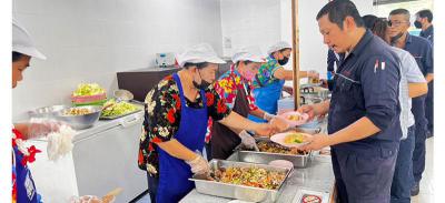 Employees eating together